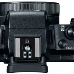 Övervy av en Canon G1X Mark III kamera med fokus på kontrollerna.